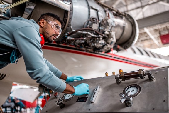 technician working on airplane