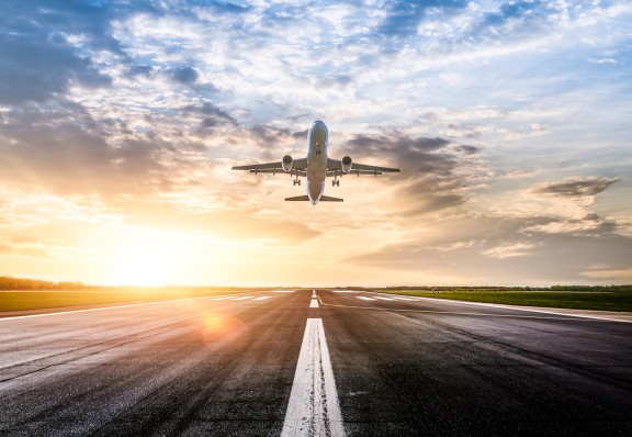 plane taking off of runway